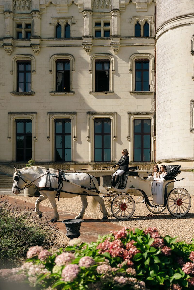 horse and carriage at a destination wedding venue in france